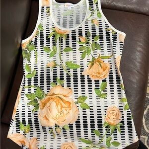 Lularoe ladies tank! Stretchy and very cute! In a large! No rips or stains!